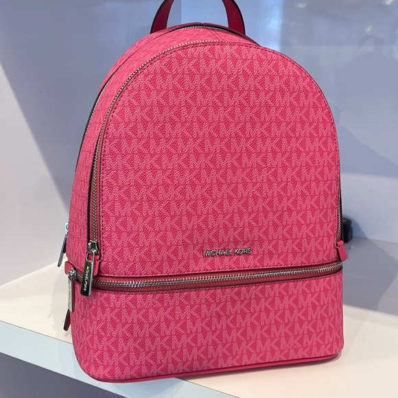 Michael Kors Handbags - Michael Kors Rhea Medium Signature Logo Backpack
Dragonfruit
NWT